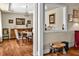 Dining room view showcasing a chandelier, hardwood flooring, and classic furnishings at 363 Rolling Meadows Ln, Chapel Hill, NC 27517