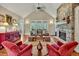 Spacious living room with vaulted ceiling and cozy stone fireplace at 363 Rolling Meadows Ln, Chapel Hill, NC 27517