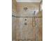 Tiled shower with overhead and handheld showerheads and built in bench at 363 Rolling Meadows Ln, Chapel Hill, NC 27517