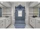 Luxurious bathroom featuring double shower heads, a white vanity, and patterned tile at 3633 Jordan Shires Dr, New Hill, NC 27562