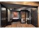 Bathroom featuring a sauna, freestanding tub, and wood accents at 3633 Jordan Shires Dr, New Hill, NC 27562