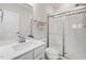 Bathroom with white vanity, enclosed glass shower and modern fixtures at 3633 Jordan Shires Dr, New Hill, NC 27562