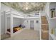 Unique bunk room with a lower sleeping area and stairs up to an upper level with themed decorations at 3633 Jordan Shires Dr, New Hill, NC 27562