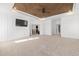 Spacious bedroom with a wood-paneled ceiling and ample natural light at 3633 Jordan Shires Dr, New Hill, NC 27562