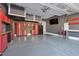 Spacious garage with ample storage cabinets, work bench, and epoxy floor at 3633 Jordan Shires Dr, New Hill, NC 27562