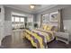 Inviting main bedroom with hardwood floors and relaxing sitting area at 3633 Jordan Shires Dr, New Hill, NC 27562