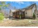 The large screened porch and fire pit are perfect for outdoor gatherings and enjoying nature at 3659 Brooks Bnd, Franklinton, NC 27525