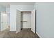 Spacious linen closet featuring neutral carpet and trim at 3659 Brooks Bnd, Franklinton, NC 27525
