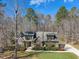 Charming home featuring landscaped front yard, an extended driveway, and mature trees surrounding the property at 3659 Brooks Bnd, Franklinton, NC 27525