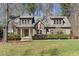 Charming home with a well-manicured lawn, beautiful landscaping, and classic architectural details at 3659 Brooks Bnd, Franklinton, NC 27525