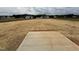 Spacious lot with a patio offers endless possibilities for outdoor enjoyment and entertaining at 394 Springtooth Dr, Zebulon, NC 27597