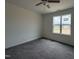 Bedroom with neutral walls, carpet flooring and a bright window with natural light at 394 Springtooth Dr, Zebulon, NC 27597