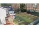 Aerial view of backyard featuring patio, seating, and fenced in yard at 402 Homestead Park Dr, Apex, NC 27502