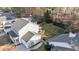 Aerial view of backyard featuring patio, seating, and fenced in yard at 402 Homestead Park Dr, Apex, NC 27502