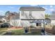 Backyard patio view with sliding glass doors and seating area at 402 Homestead Park Dr, Apex, NC 27502