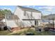 Backyard patio view with sliding glass doors and seating area at 402 Homestead Park Dr, Apex, NC 27502