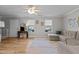 This living room is perfect for Gathering gatherings with a plush sofa, large rug, and bright windows at 402 Homestead Park Dr, Apex, NC 27502
