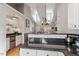 Stylish kitchen with stainless steel appliances and granite countertops at 408 E Maple Ave, Holly Springs, NC 27540