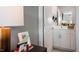 Bright bathroom features a white vanity with a mirror and a view into the rest of the space at 416 Belgian Red Way, Wake Forest, NC 27587