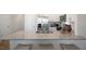 Well-lit kitchen with granite countertops, stainless steel appliances, and a convenient island with seating at 416 Belgian Red Way, Wake Forest, NC 27587