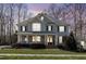 Charming two-story home with a manicured front yard and inviting front porch at 4228 Bibleway Ct, Holly Springs, NC 27540