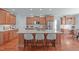Spacious kitchen featuring an oversized granite island and ample cabinet space at 4228 Bibleway Ct, Holly Springs, NC 27540