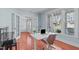 Bright office space with french doors, large window, and modern desk at 4228 Bibleway Ct, Holly Springs, NC 27540