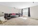 Bonus room with a projector screen, comfortable seating, and neutral walls, perfect for entertainment at 424 Hopwood Way Way, Apex, NC 27523
