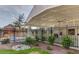 Community amenity center with a covered area, ceiling fan, landscaping and an iron fence at 424 Hopwood Way Way, Apex, NC 27523