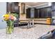 Close-up of a well-appointed kitchen with granite countertops, stainless steel appliances, and stylish fixtures at 424 Hopwood Way Way, Apex, NC 27523