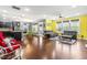 Bright open-concept living room features hardwood floors, modern decor, and abundant natural light at 424 Hopwood Way Way, Apex, NC 27523