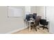 This well-lit office features a desk, office chairs, and a whiteboard on the wall at 424 Hopwood Way Way, Apex, NC 27523