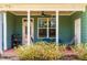 Relaxing covered patio with a grill, chairs, and a view of the backyard at 424 Hopwood Way Way, Apex, NC 27523