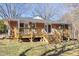 Expansive backyard featuring a spacious deck, ideal for outdoor enjoyment at 4605 Erwin Rd, Durham, NC 27705