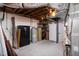Unfinished basement featuring exposed ductwork, utility equipment, and ample storage space at 4605 Erwin Rd, Durham, NC 27705