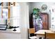 Charming dining room showcasing shelves, plants, and an antique cabinet at 4605 Erwin Rd, Durham, NC 27705