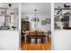 Inviting dining room with hardwood floors and natural light, creating an ideal space for gatherings at 4605 Erwin Rd, Durham, NC 27705