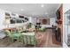 Spacious living room with a brick fireplace, ample seating, and stylish decor at 4605 Erwin Rd, Durham, NC 27705
