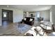 Bright, open living space featuring living room, dining area and kitchen, ideal for entertaining at 472 Springtooth Dr, Zebulon, NC 27597