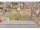 Wide backyard features mature trees and a small shed at 4816 Stafford Dr, Durham, NC 27705