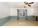Bright dining area with a ceiling fan and view of the kitchen at 4816 Stafford Dr, Durham, NC 27705