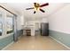 Open-concept kitchen and dining area with plenty of natural light and stainless steel appliances at 4816 Stafford Dr, Durham, NC 27705