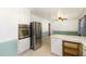 Spacious kitchen with stainless steel appliances, ample cabinet space, and open layout at 4816 Stafford Dr, Durham, NC 27705