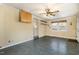 Inviting living room with ample natural light, built-in shelving, and a view into the kitchen at 4816 Stafford Dr, Durham, NC 27705