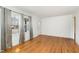 Bright and airy living room with hardwood floors and neutral walls at 4816 Stafford Dr, Durham, NC 27705