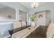 Bright dining area with seating and view of the kitchen at 55 Oak Leaf Dr, Lillington, NC 27546