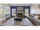 Cozy living room with a fireplace, TV, and comfortable seating, perfect for relaxation at 55 Oak Leaf Dr, Lillington, NC 27546