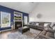 Comfortable living room with fireplace and large sectional couch at 55 Oak Leaf Dr, Lillington, NC 27546