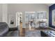 Bright living room with view to dining area at 55 Oak Leaf Dr, Lillington, NC 27546