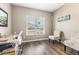 Bright home office with natural light, desk, and comfortable seating at 55 Oak Leaf Dr, Lillington, NC 27546
